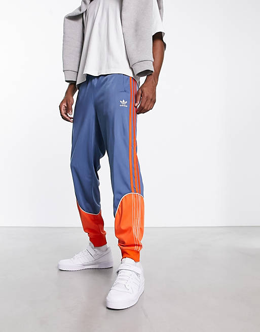 Informeer Gelijkmatig Disciplinair adidas Originals SPRT tricot track pants in blue and orange | ASOS