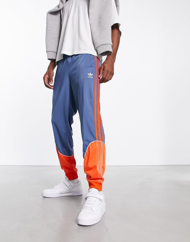 adidas Originals SPRT tricot track pants in blue and orange