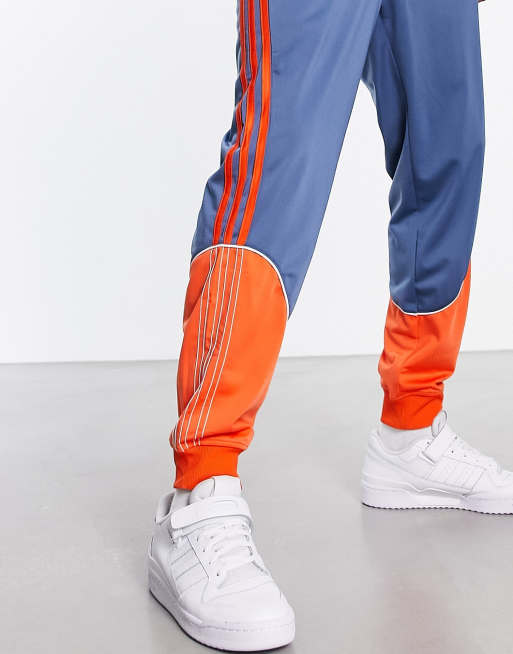 adidas Originals SPRT tricot track pants in blue and orange