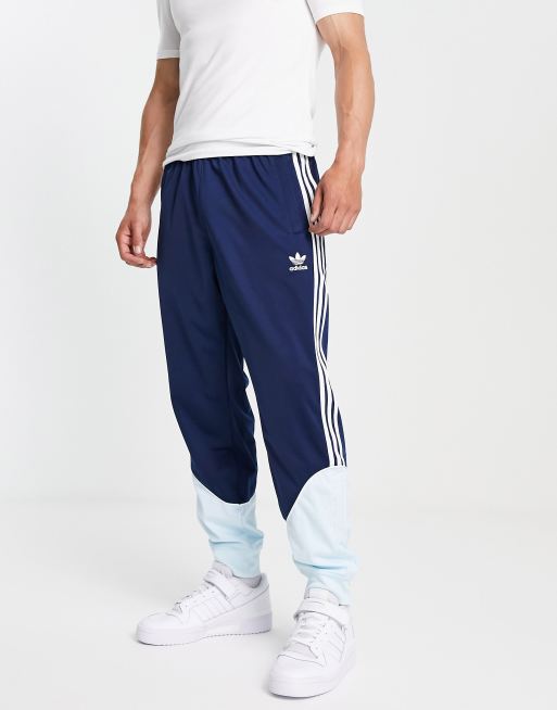 adidas Originals SPRT tricot track pants in navy and blue