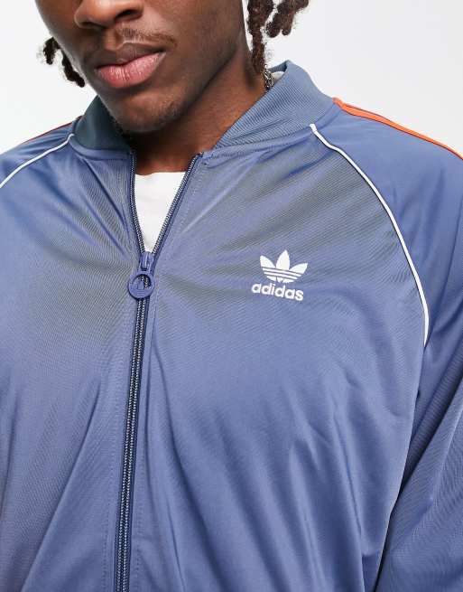 tricot track top with contrast arms in blue and orange |