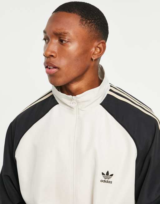 Adidas us track order zip sale