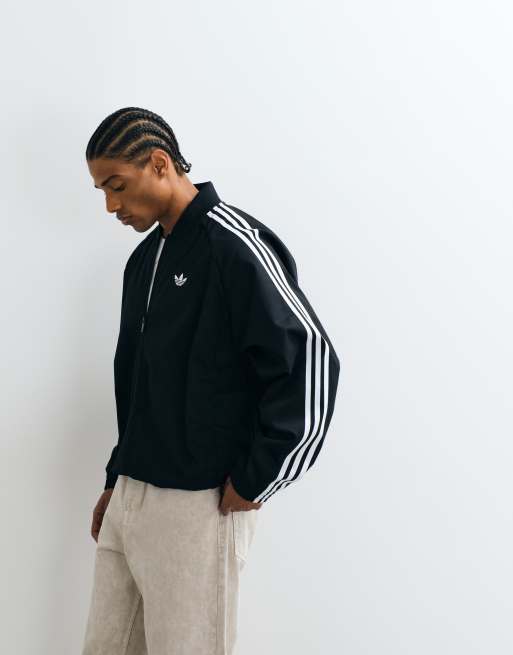 adidas Originals – SST Adicolor Classics – Trainingsjacke aus Baumwoll-Twill in Schwarz, 1 von 5