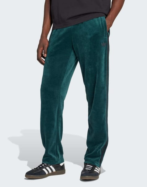adidas Originals Sst adicolor velour track pants in aurora ivy - view 1