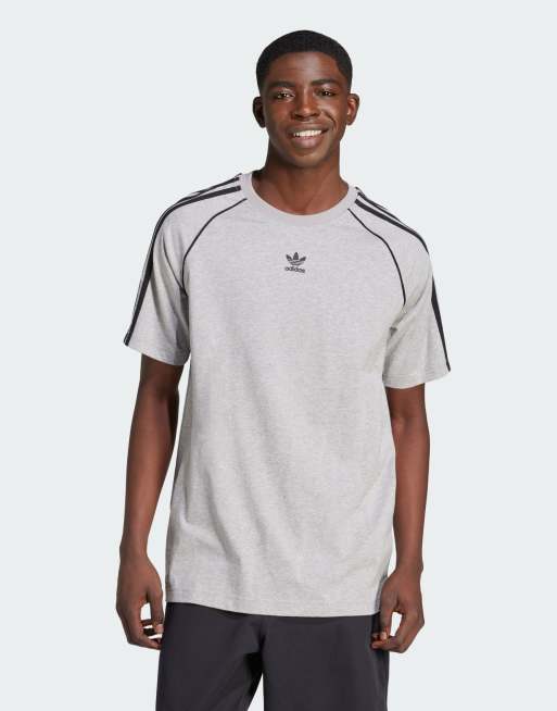 T shirt store adidas grigia