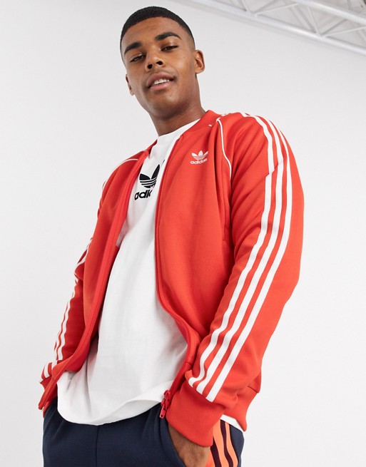adidas Originals SST track top in lush red