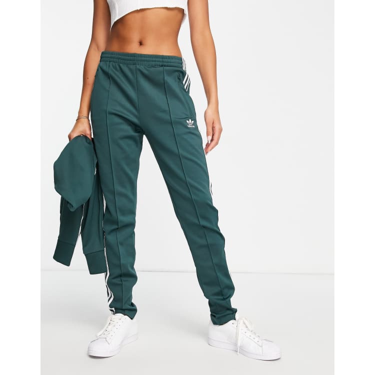 Reageren Vergemakkelijken Verslaafd adidas Originals - SST - Trainingsbroek in collegestijl groen | ASOS