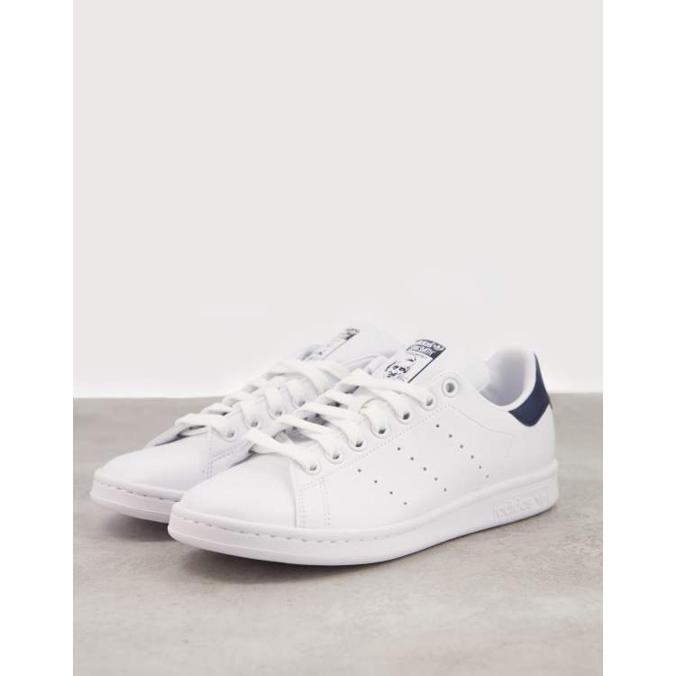 Stan smith homme hotsell blanche et bleu marine