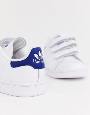 white and navy blue stan smiths