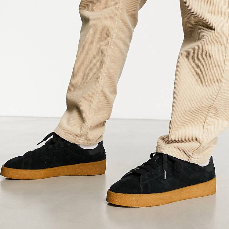 versus Kwik inch adidas Originals Stan Smith Crepe sneakers in black with gum sole | ASOS