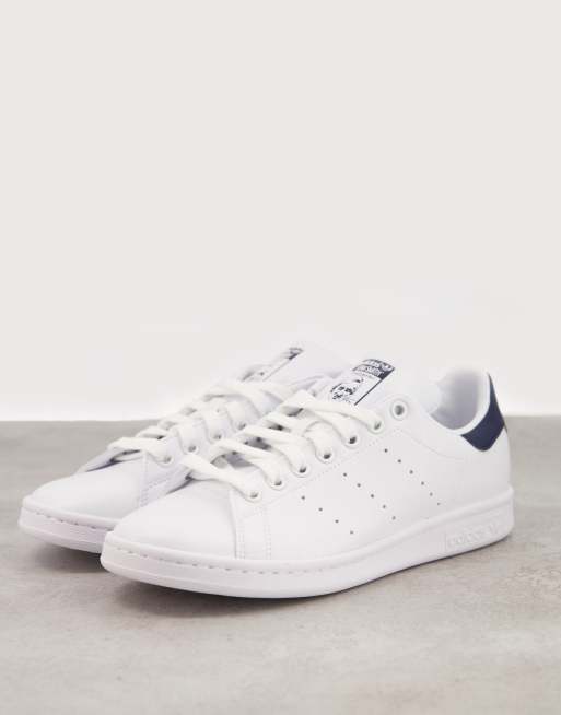 Adidas originals stan smith sneakers in white and navy hotsell