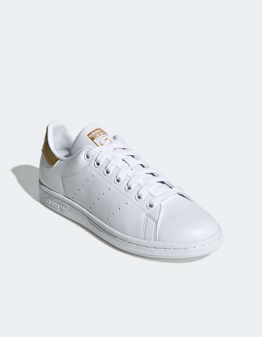 Scarpe adidas bianche e oro deals