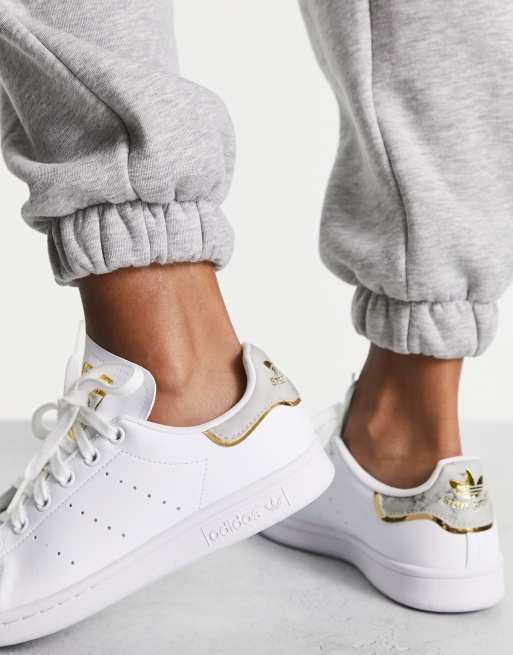 adidas Originals Stan Smith trainers in off white and gold