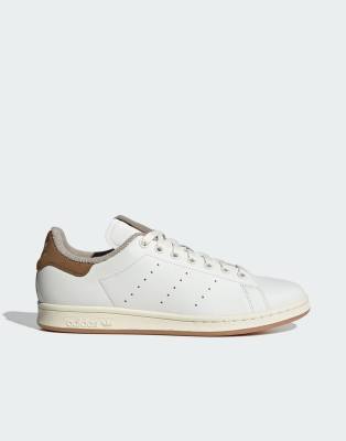 adidas Originals stan smith trainer in white and bronze