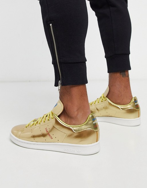 adidas Originals Stan Smith trainers in gold tech pack