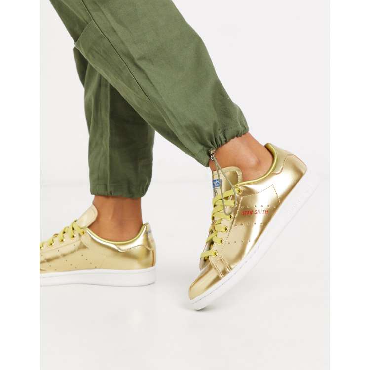 adidas Originals Stan Smith trainers in gold