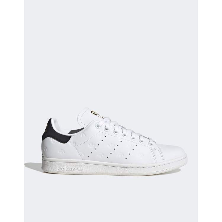 Adidas stan smith trainers in white store and black