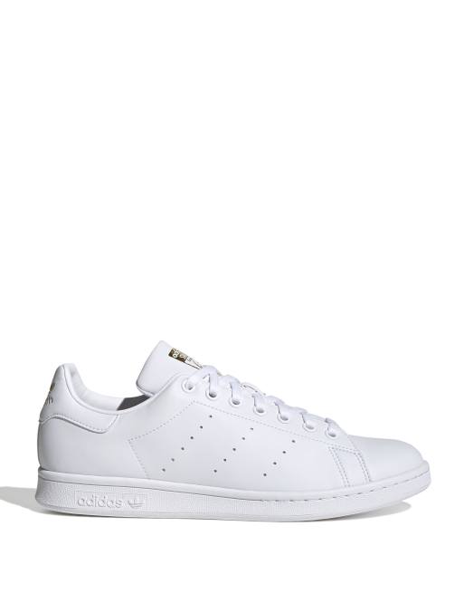 adidas Originals Stan Smith trainers in white and gold