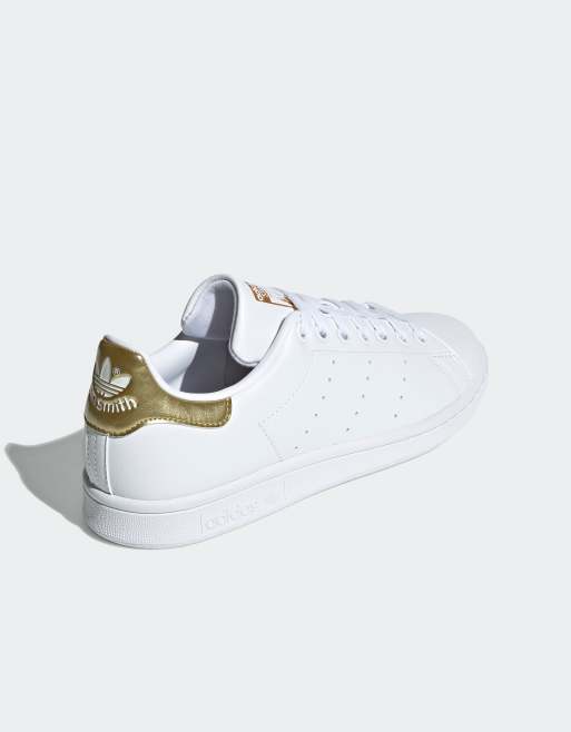 adidas Originals Stan Smith trainers in white gold