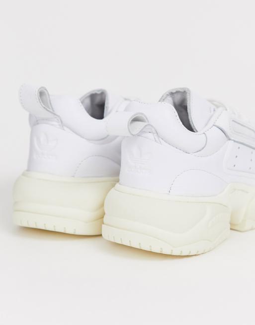 Adidas originals supercourt rx sneakers in on sale white x home of classics edition