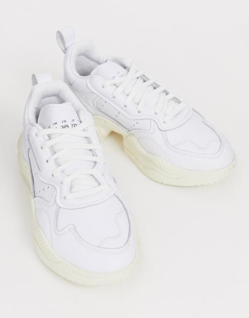 Adidas originals supercourt rx trainers in hotsell white x home of classics edition