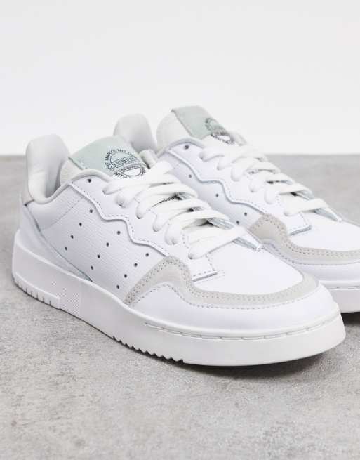 adidas Originals Supercourt Sneakers color bianco verde Dash e nero Core ASOS