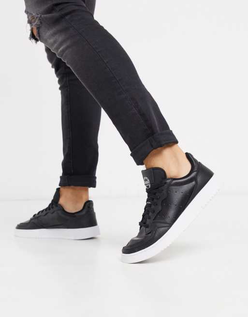 Adidas black hot sale sneakers womens