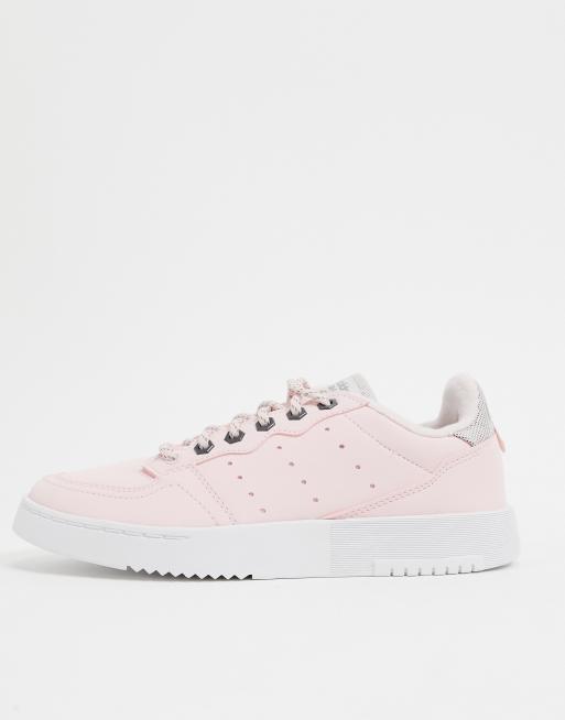 adidas Originals Supercourt Sneakers in halo roze en trace groen