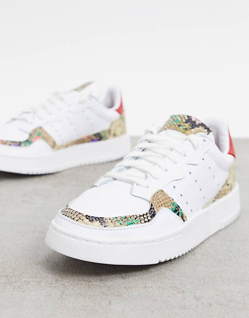 adidas Originals Supercourt sneakers in white and animal print