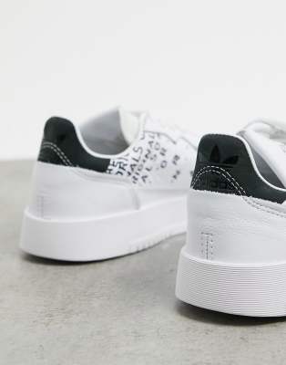 adidas originals supercourt trainers in white dash green & core black