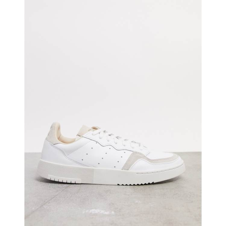 adidas supercourt sneakers in white |