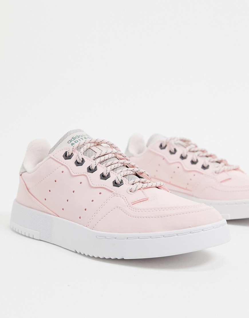 Adidas Originals Supercourt trainers in halo pink & trace green