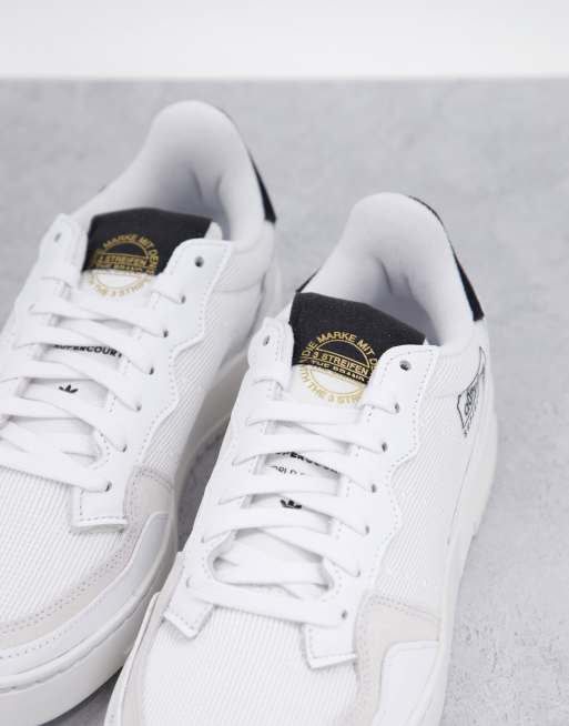 adidas Originals Supercourt trainers in white and black