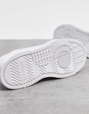 adidas originals supercourt trainers in white dash green & core black