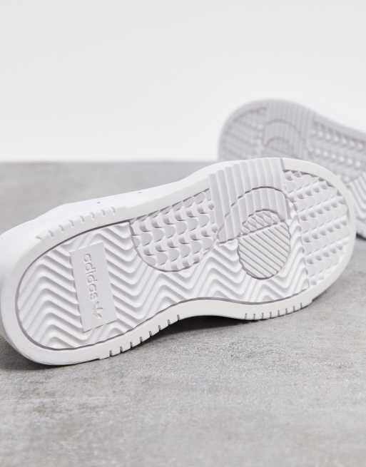 adidas Originals Supercourt trainers in white dash green core black