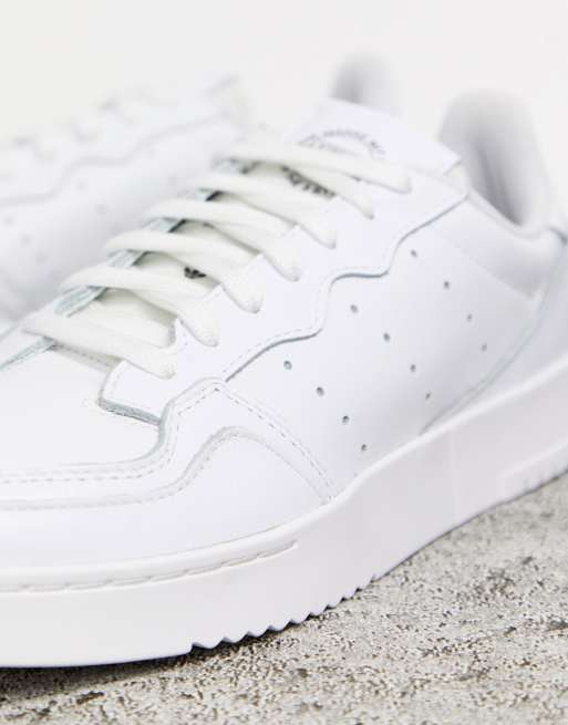 Adidas originals supercourt trainers in white with cord heel cheap tab