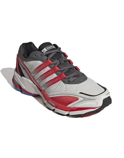 Adidas rosse outlet e grigie