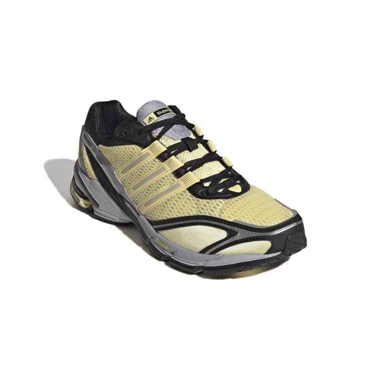 Black and outlet yellow adidas trainers