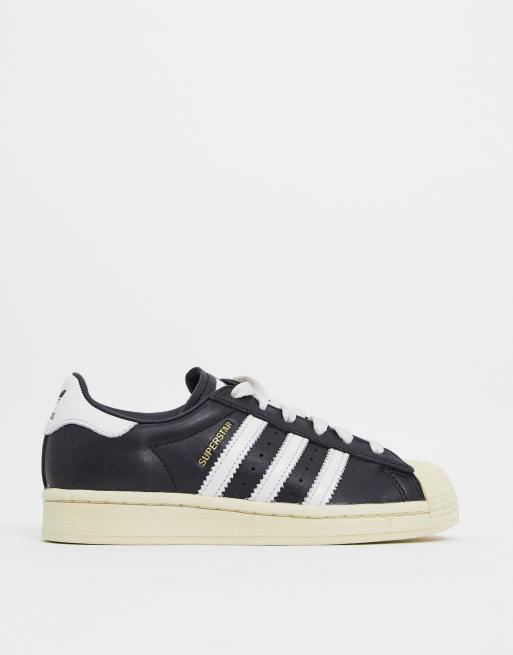 adidas Originals Superstar 80's sneakers in black and white | ASOS