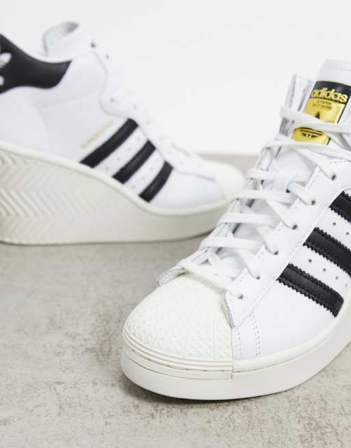 Reciteren Wat Darmen Adidas Originals - Superstar 80's - Sneakers met hak in wit en zwart | ASOS