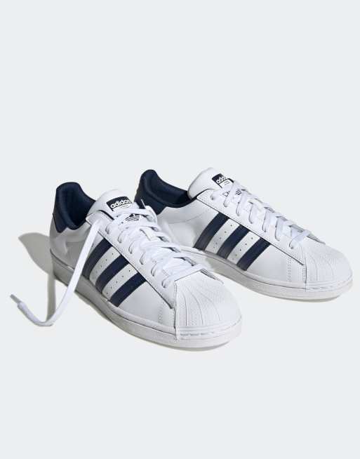 Superstar blanche store bleu marine