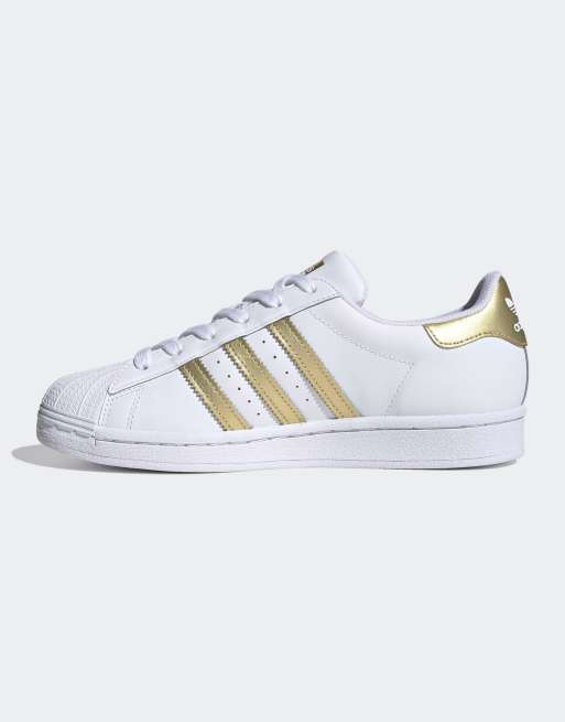 Adidas superstar blanche store et doré