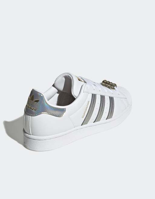 Adidas superstar dore store et blanche