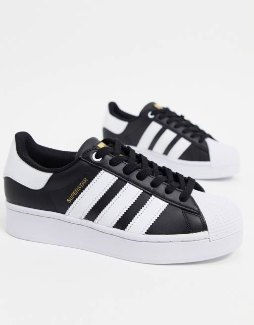 adidas Originals Superstar Bold platform trainers in black and white