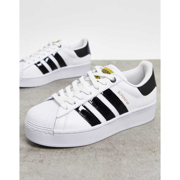 adidas Originals Superstar Bold platform trainers in white and black