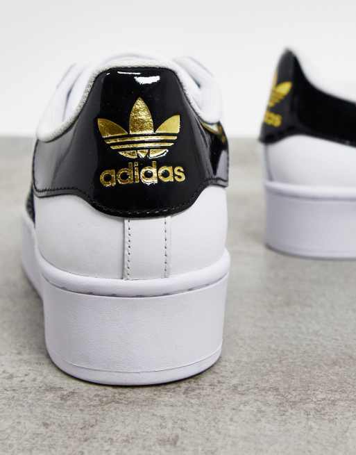 adidas Originals Superstar Bold platform trainers in white and black