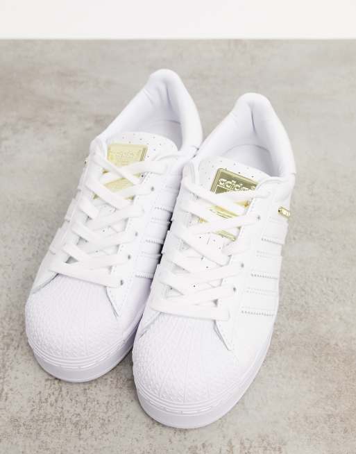 Scarpe adidas bianche e cheap oro prezzo