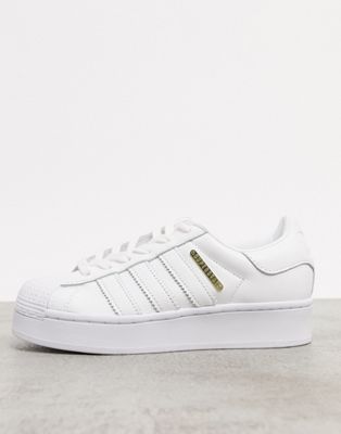 adidas white & gold superstar trainers