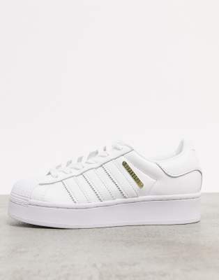 adidas Originals Superstar Bold Premium trainers in white with gold detail  | ASOS