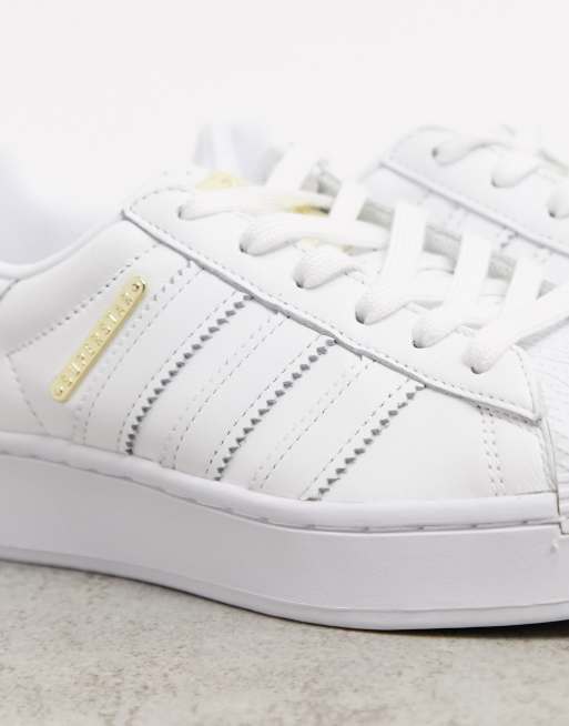 adidas Originals Superstar Bold Premium trainers in white with gold detail